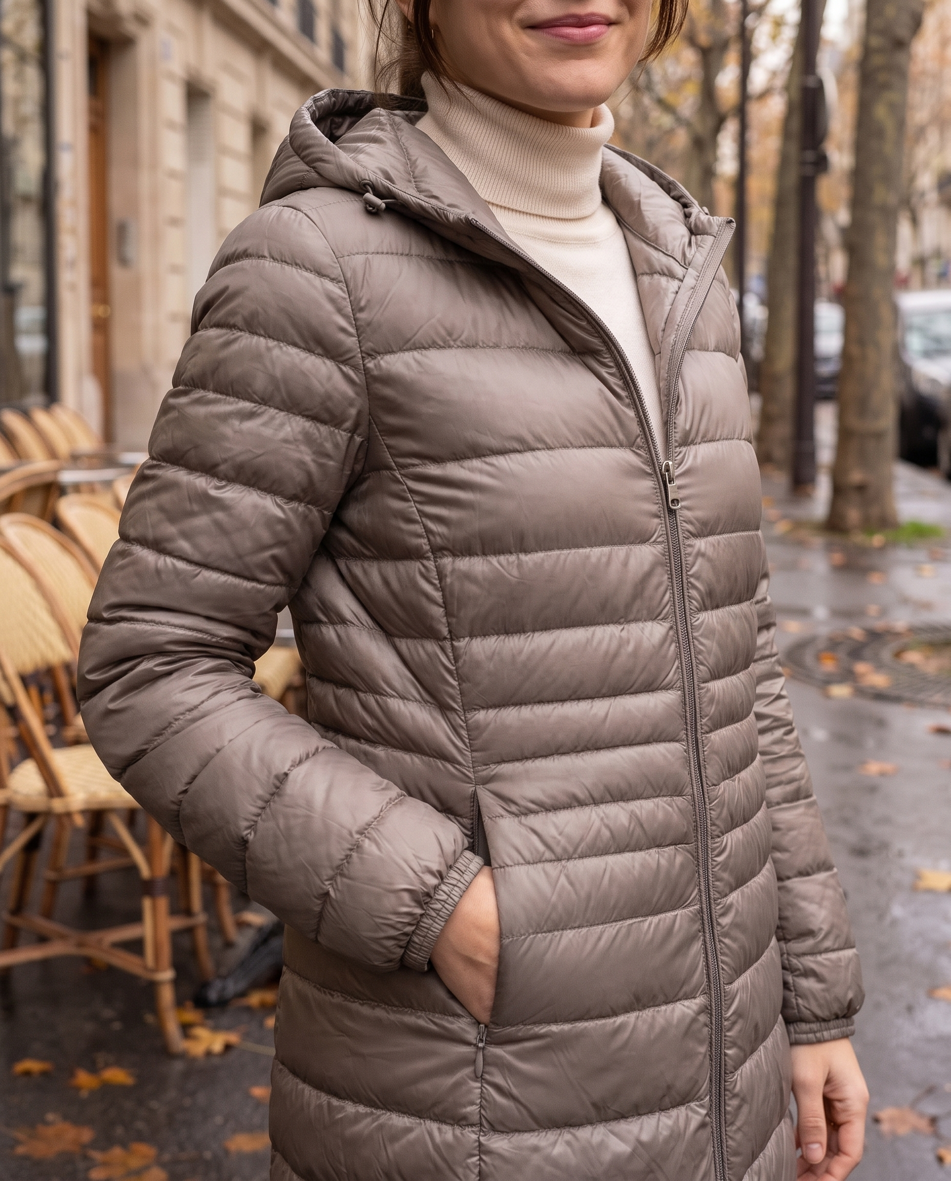 Doudoune légère à capuche Élise — détail matelassage et zip